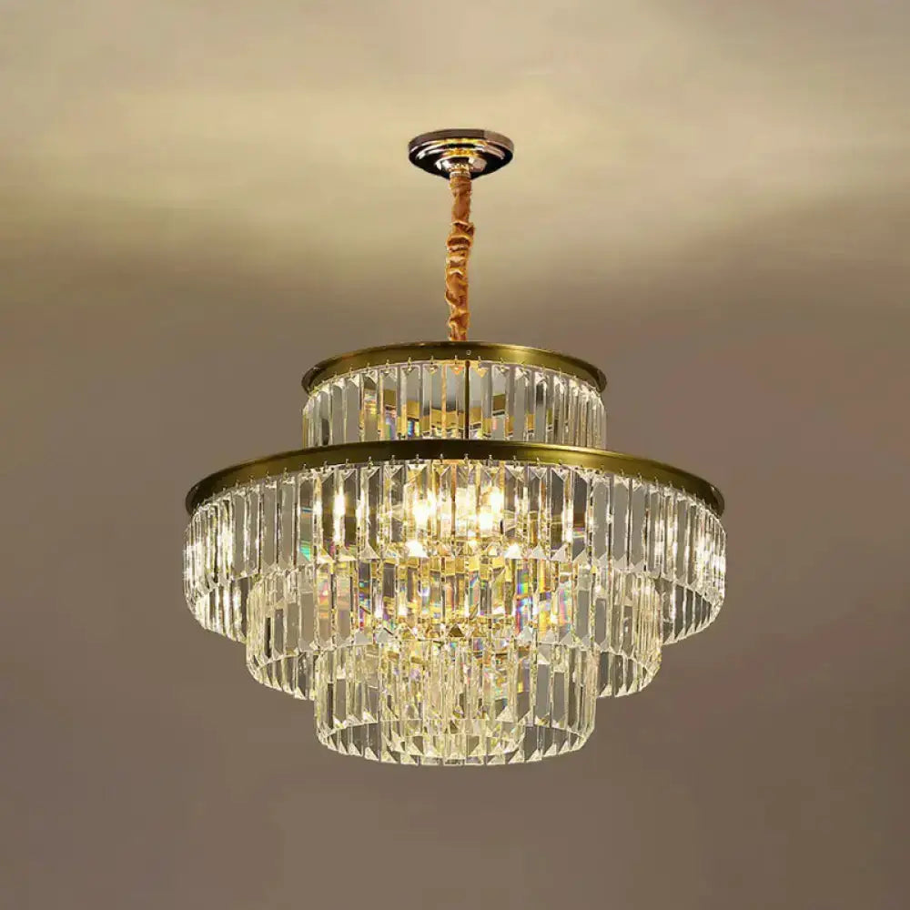 Modern brass crystal prism pendant light with tiered strands by Decorbites on Tampa Home & Garden Store