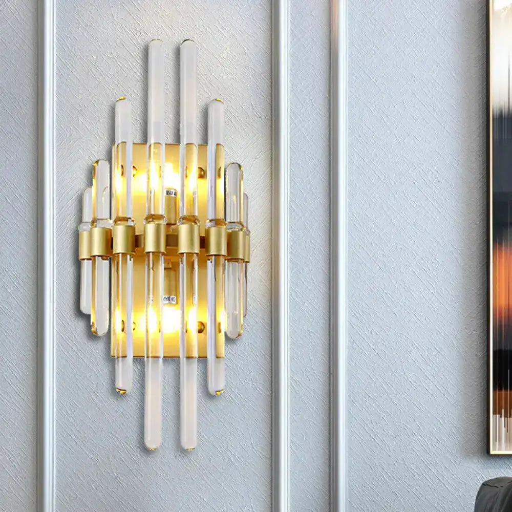 Modern brass crystal tube wall sconce with glass tubes by Decorbites warm glow on Tampa Home & Garden Store