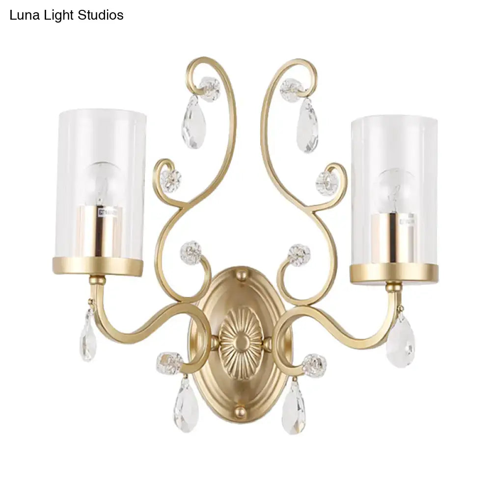 Brass crystal glass 2-bulb sconce by Decorbites with curved arms and crystal drops on Tampa Home & Garden Store