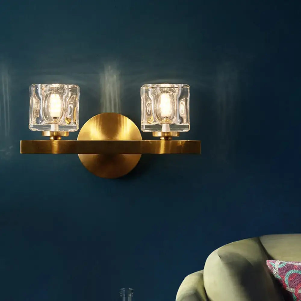 Decorbites Brass Cube Flush Sconce with dual glass cube shades, brass wall-mounted fixture on Tampa Home & Garden Store