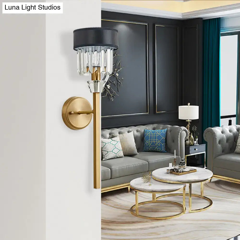 Brass fabric shade cylinder sconce on wall with crystal fringe accents, Decorbites on Tampa Home & Garden Store