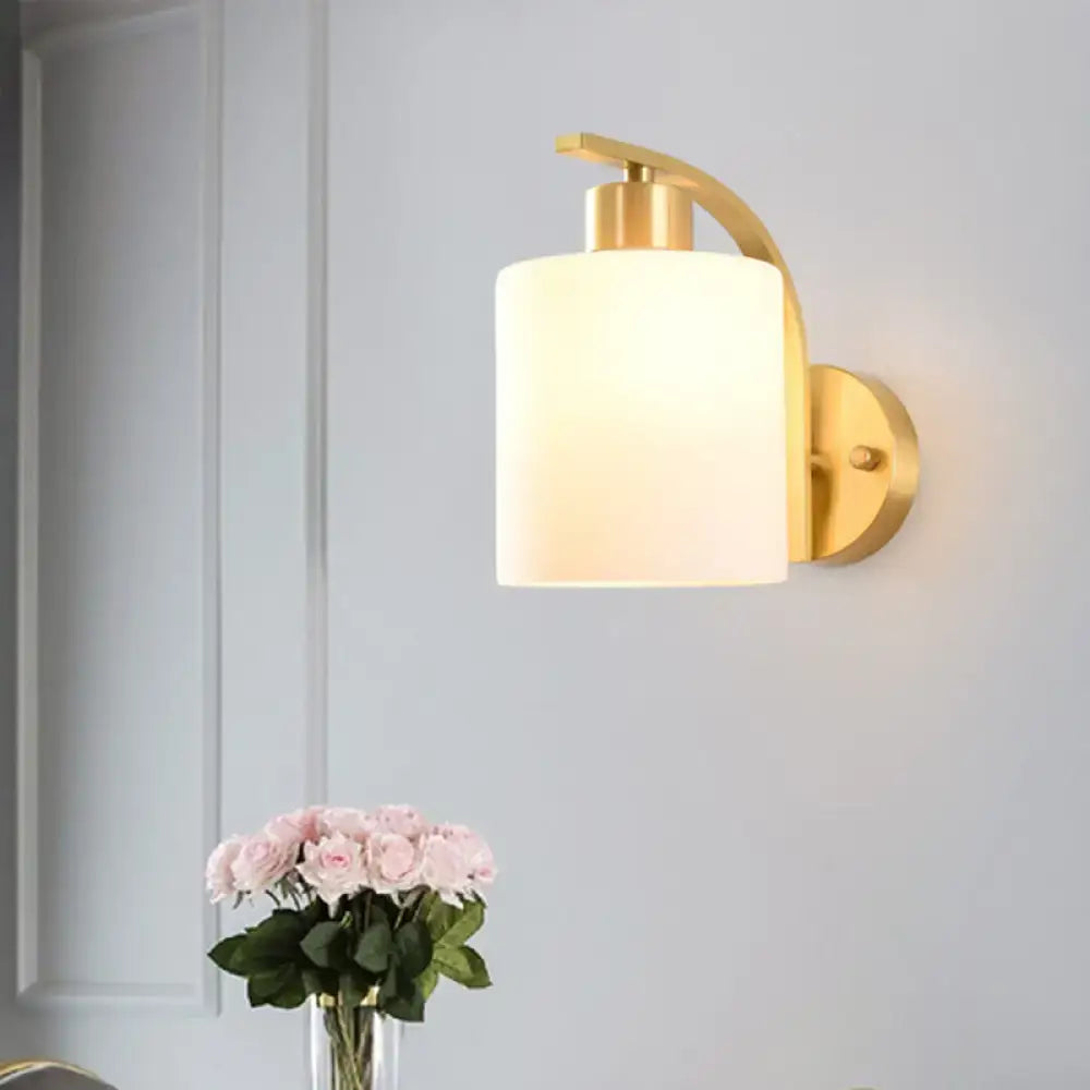 Brass milk glass direct-wired wall sconce with frosted shade by Decorbites on Tampa Home & Garden Store