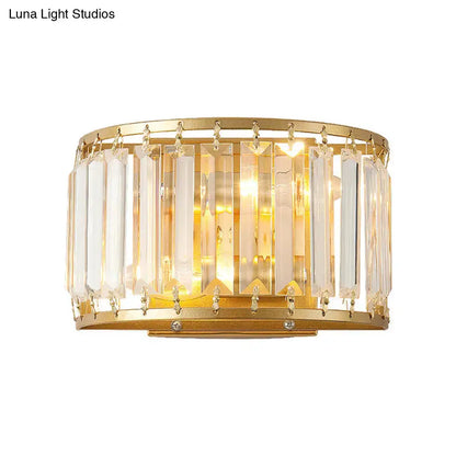 Brass crystal drum wall sconce by Decorbites with gold finish and hanging prisms on Tampa Home & Garden Store