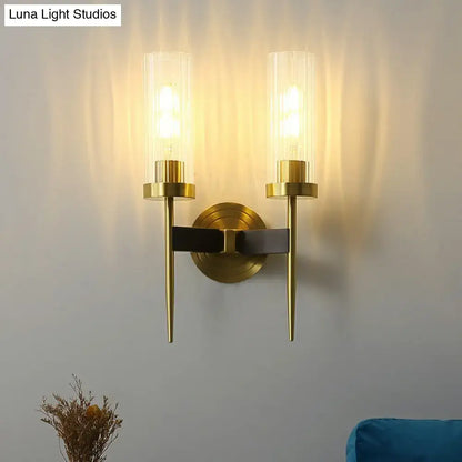 Brass glass-tube wall light sconce with dual candle bulbs by Decorbites, gold finish on Tampa Home & Garden Store