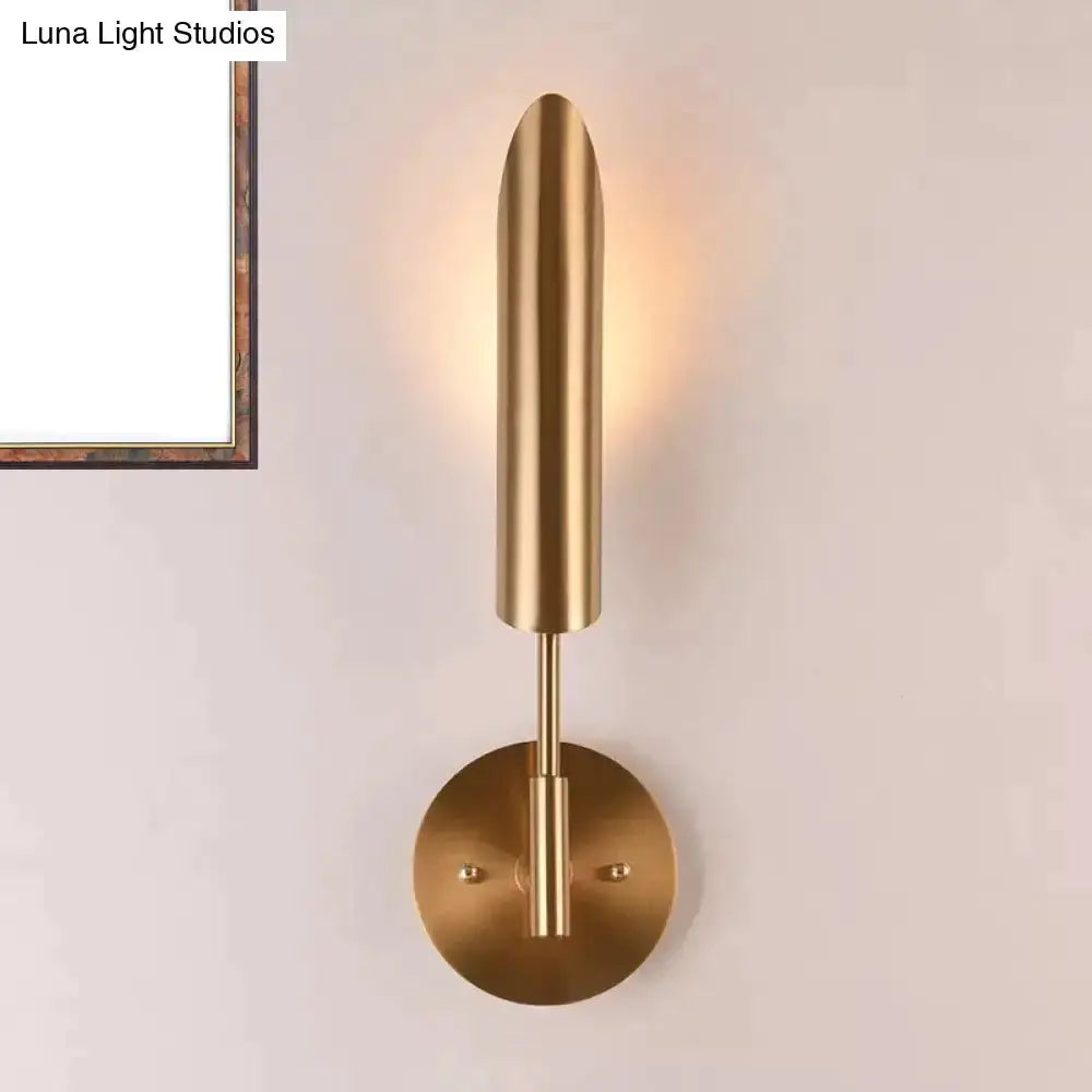 Decorbites brass LED wall lamp sconce with tall cylindrical form and round wall mount on Tampa Home & Garden Store