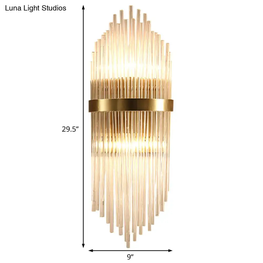Brass fluted glass sconce with trailing arm design, gold wall light by Decorbites on Tampa Home & Garden Store