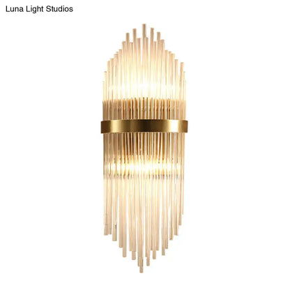 Brass fluted glass sconce with trailing arm design, warm glow wall light Decorbites on Tampa Home & Garden Store