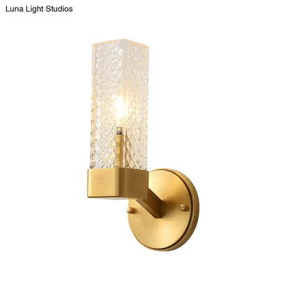 Brass wall lamp with cubic lattice glass shade and round mounting plate on Tampa Home & Garden Store