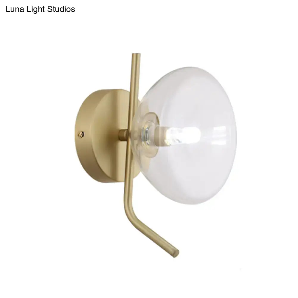 Brass dome wall sconce with clear glass globe by Decorbites on Tampa Home & Garden Store
