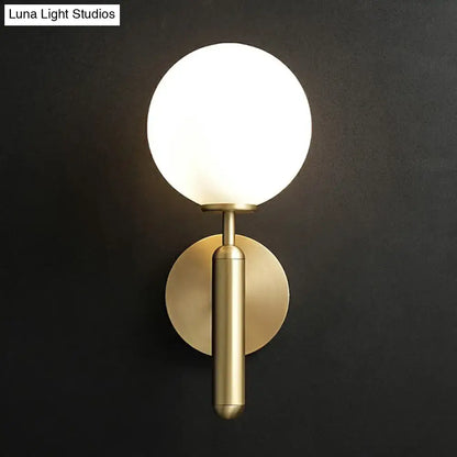 Glass Ball Wall Sconce, brass gold finish with white glass globe by Decorbites on Tampa Home & Garden Store
