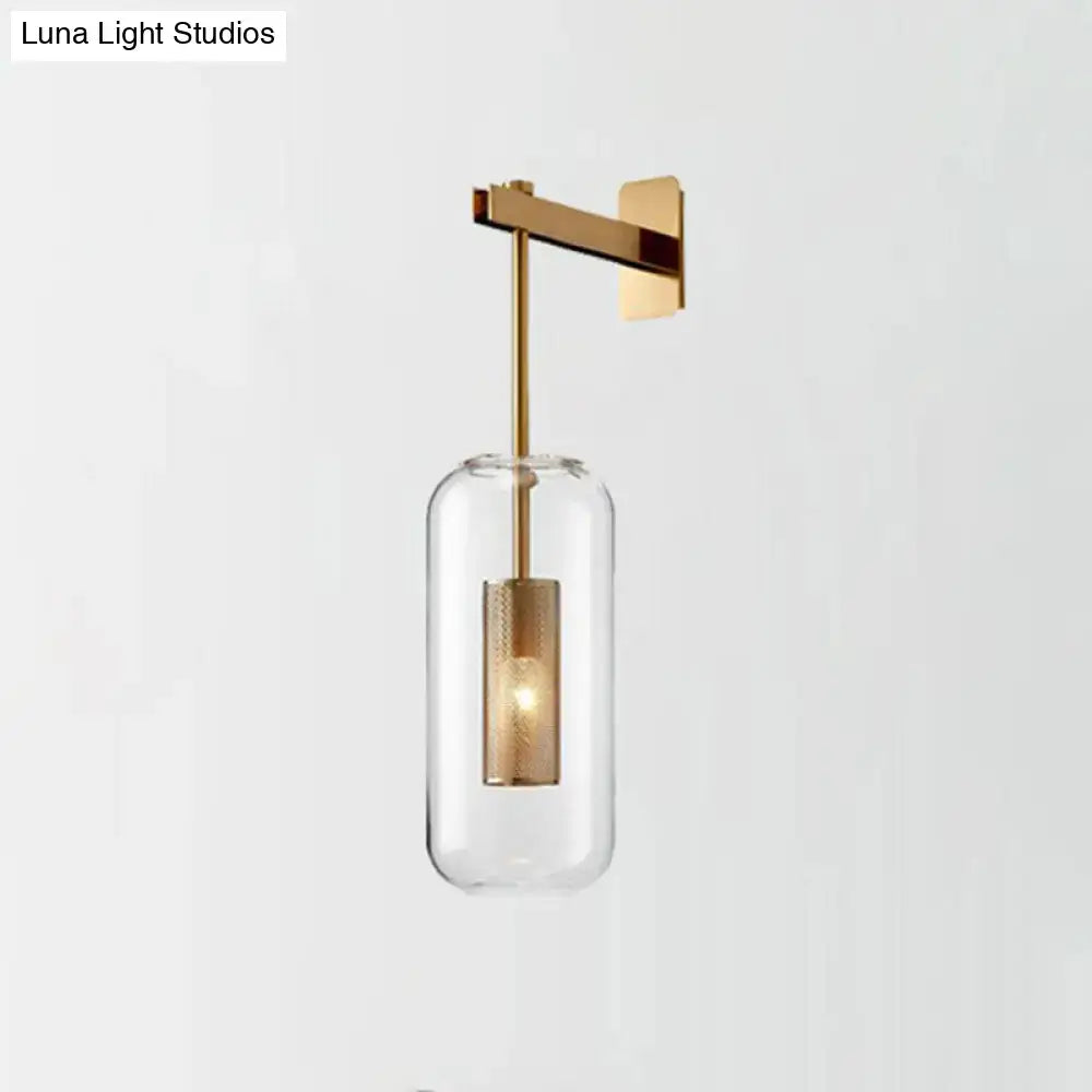 Brass mesh wall sconce by Decorbites with clear glass cylinder shade and wall-mount on Tampa Home & Garden Store