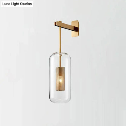 Brass mesh wall sconce by Decorbites with clear glass cylinder shade and wall-mount on Tampa Home & Garden Store