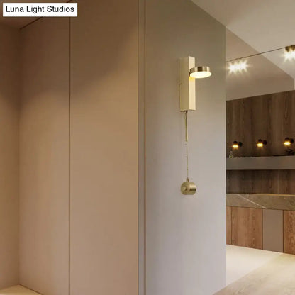 Brass L-Shaped Wall Sconce by Decorbites, with pull chain and rectangular plate on Tampa Home & Garden Store