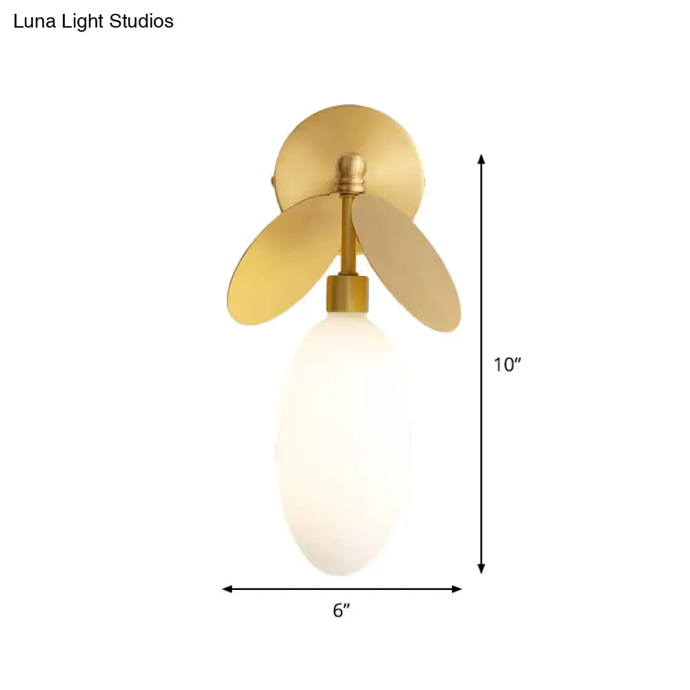 Modern brass leaf wall lamp with cream glass shade bedroom sconce Decorbites 6x10 in on Tampa Home & Garden Store