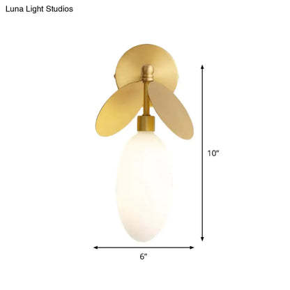 Modern brass leaf wall lamp with cream glass shade bedroom sconce Decorbites 6x10 in on Tampa Home & Garden Store