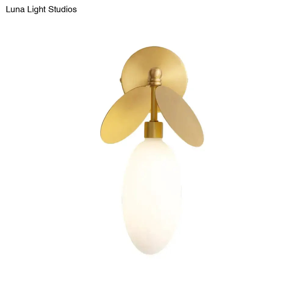 Modern brass leaf wall lamp with cream glass shade bedroom sconce by Decorbites on Tampa Home & Garden Store