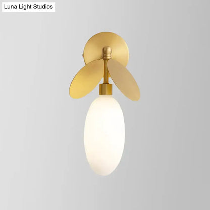 Modern brass leaf wall lamp with cream glass shade bedroom sconce by Decorbites on Tampa Home & Garden Store