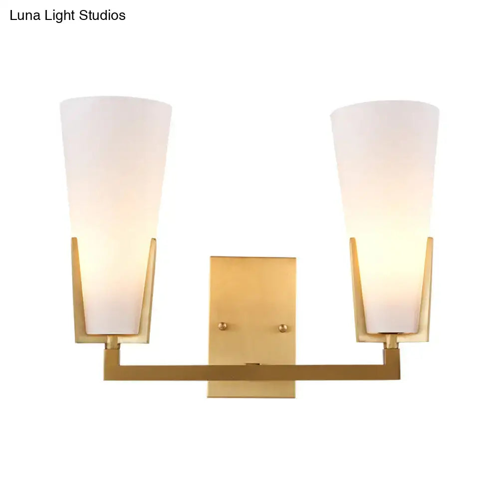 Brass white glass wall sconce by Decorbites with dual frosted shades and square backplate on Tampa Home & Garden Store