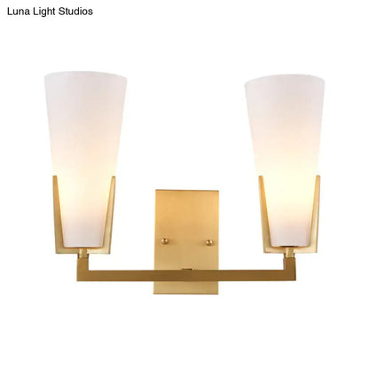Brass white glass wall sconce by Decorbites with dual frosted shades and square backplate on Tampa Home & Garden Store