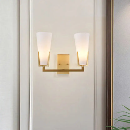 Brass white glass wall sconce by Decorbites, dual-arm fixture with frosted glass shades on Tampa Home & Garden Store