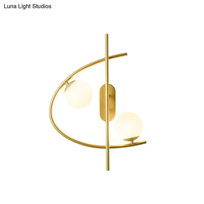 Brass Milk Glass Post-Modern Sconce by Decorbites; curved brass arc with two milk-glass globes on Tampa Home & Garden Store