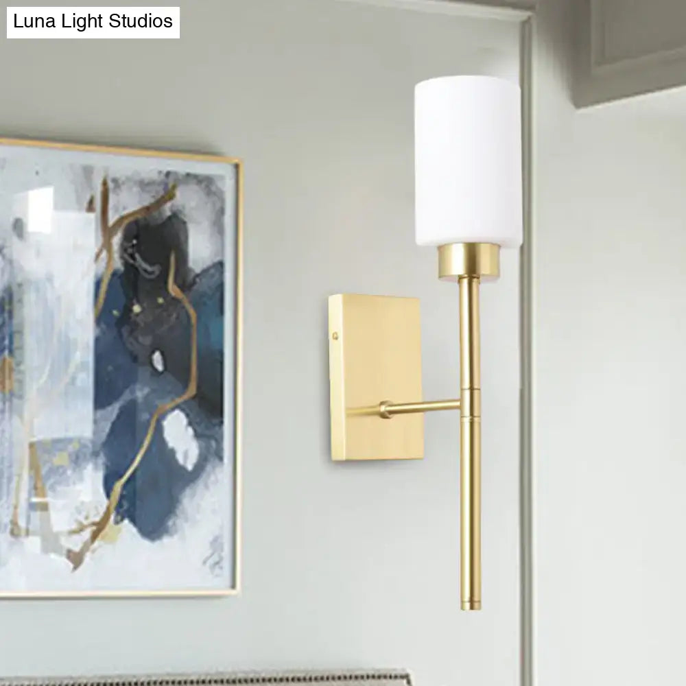 Brass opal glass tube sconce by Decorbites with white shade wall mount on Tampa Home & Garden Store