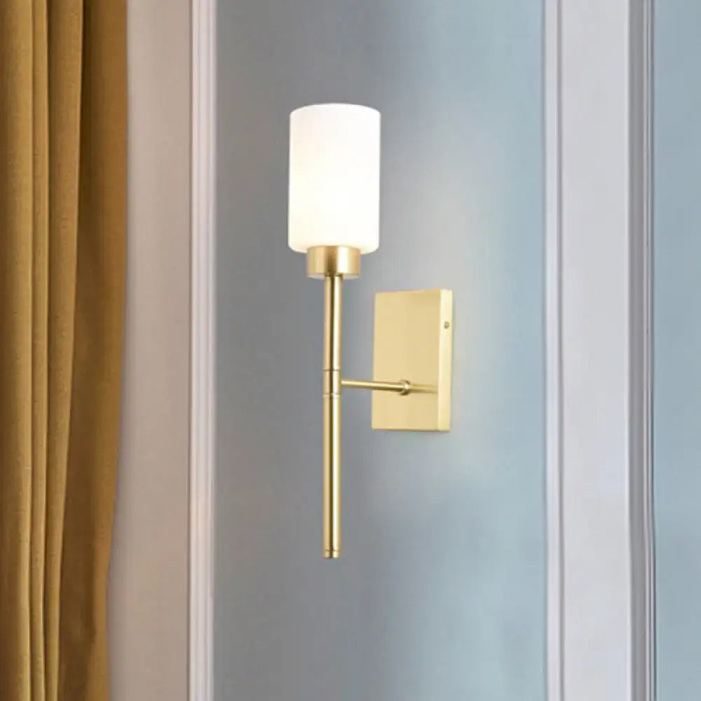 Brass opal glass tube sconce with white cylindrical shade on wall mount Decorbites on Tampa Home & Garden Store