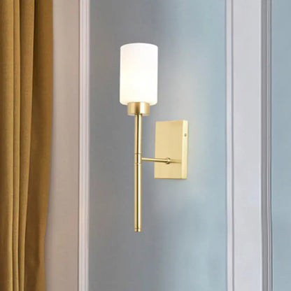 Brass opal glass tube sconce with white cylindrical shade on wall mount Decorbites on Tampa Home & Garden Store