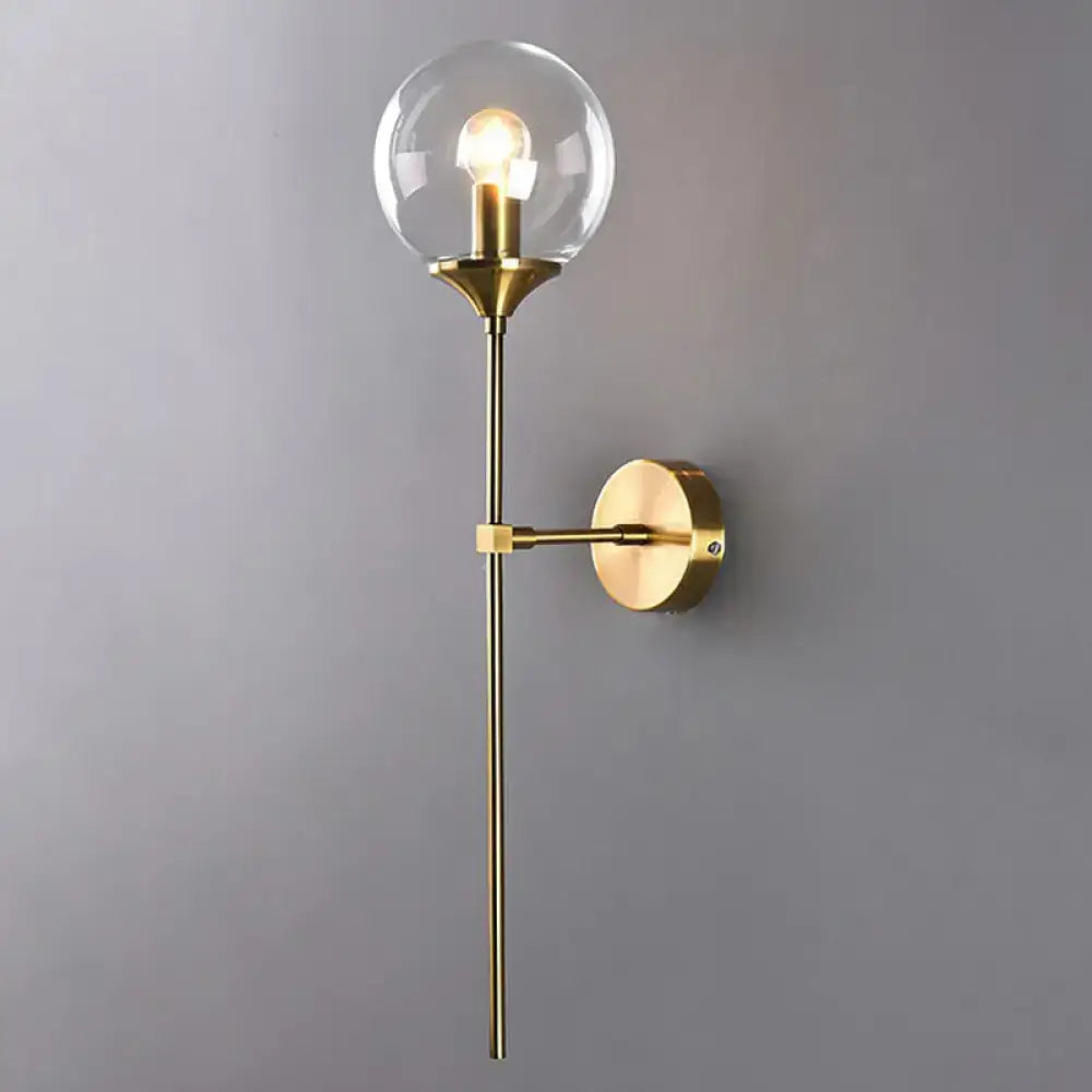 Brass pencil adjustable arm wall sconce with clear glass globe bulb Decorbites on Tampa Home & Garden Store