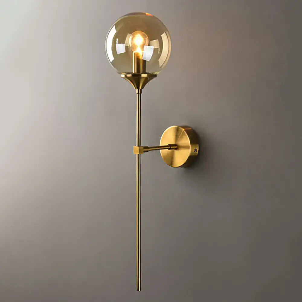 Brass pencil adjustable arm wall sconce with clear glass globe bulb Decorbites on Tampa Home & Garden Store