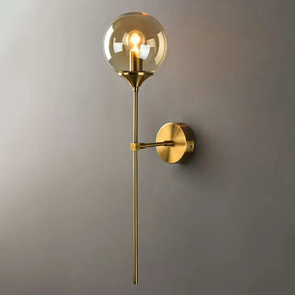 Brass pencil adjustable arm wall sconce with clear glass globe bulb Decorbites on Tampa Home & Garden Store