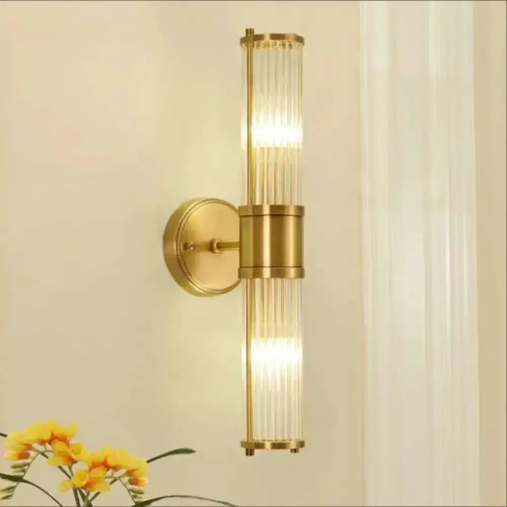 Decorbites modern brass ridged crystal wall sconce hallway fixture with vertical glass tubes on Tampa Home & Garden Store