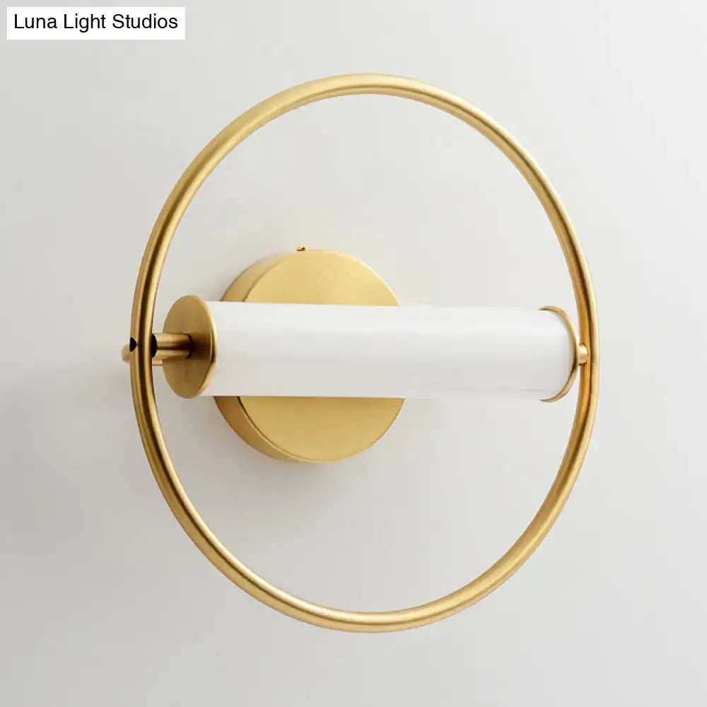 Brass opal glass industrial sconce with circular ring and white tubular shade Decorbites on Tampa Home & Garden Store