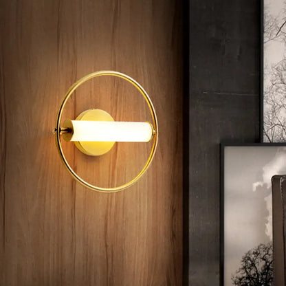 Brass opal glass industrial wall sconce with ring and frosted tube light on Tampa Home & Garden Store