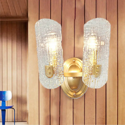 Brass water glass sconce dual-light with gold finish and textured glass shades Decorbites on Tampa Home & Garden Store