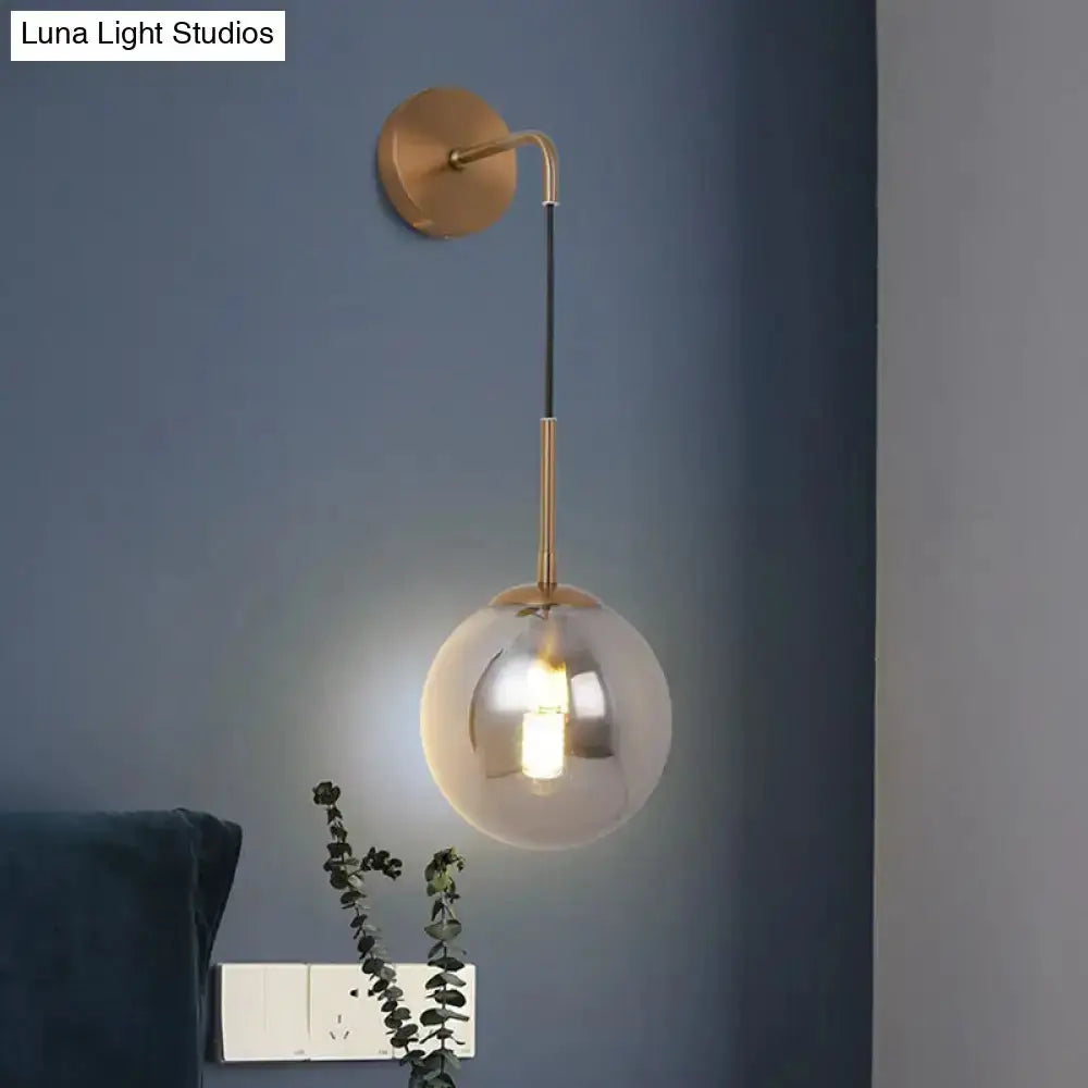 Modern brass smoked-glass ball wall hanging lamp with brass arm Decorbites on Tampa Home & Garden Store