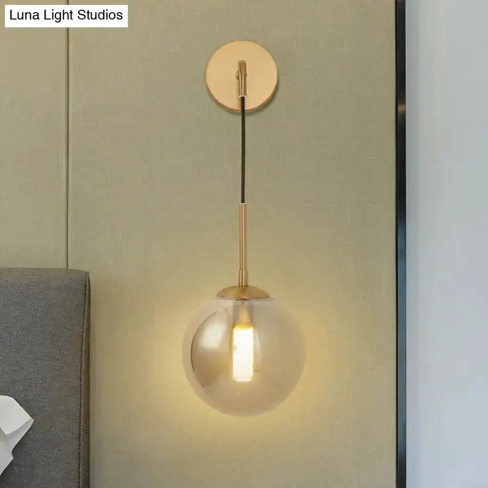 Modern brass smoked glass ball wall lamp for bedroom, hanging wall light with backplate on Tampa Home & Garden Store