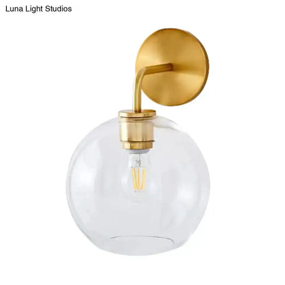 Modern Brass Wall Lamp with Glass Globe Bedroom