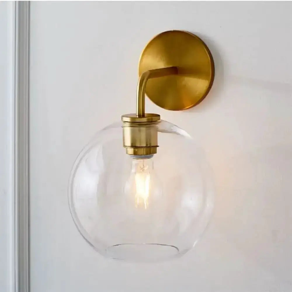 Modern Brass Wall Lamp with Glass Globe Bedroom