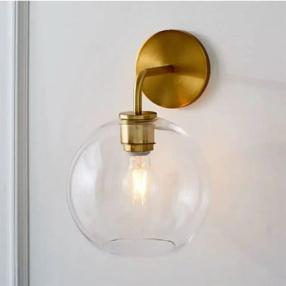 Modern Brass Wall Lamp with Glass Globe Bedroom