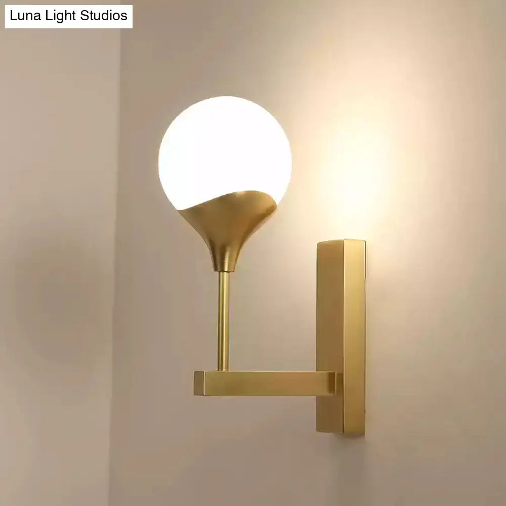 Brass Cream Glass Wall Lamp by Decorbites, gold-toned wall sconce with white globe on Tampa Home & Garden Store