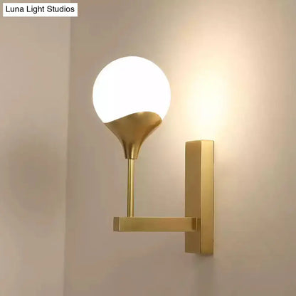 Brass Cream Glass Wall Lamp by Decorbites, gold-toned wall sconce with white globe on Tampa Home & Garden Store