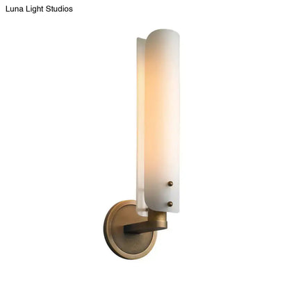 Brass Opal Glass Wall Sconce by Decorbites, vertical opal shade, brass mount, warm glow on Tampa Home & Garden Store