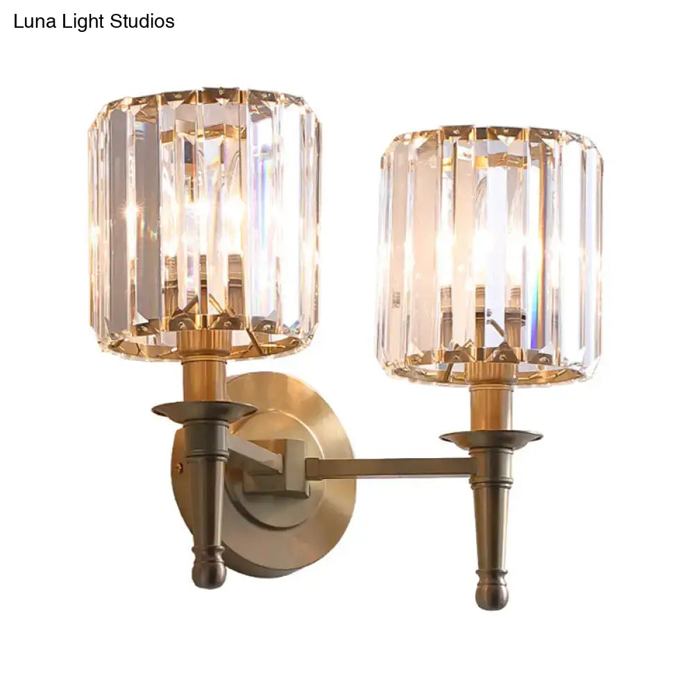 Brass dual-light wall sconce by Decorbites with crystal shade prisms on Tampa Home & Garden Store