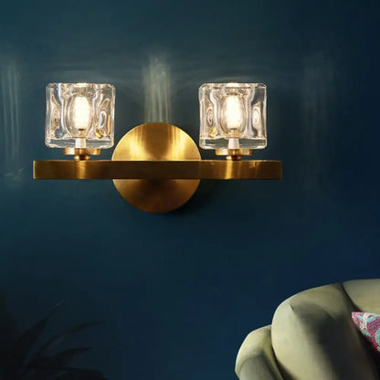 Brass crystal block cylindrical light wall sconce with dual glass shades by Decorbites on Tampa Home & Garden Store