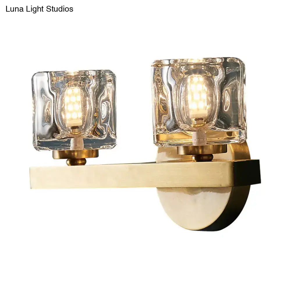 Brass Crystal Block Cylindrical Light fixture with twin glass crystal blocks and warm LED glow on Tampa Home & Garden Store