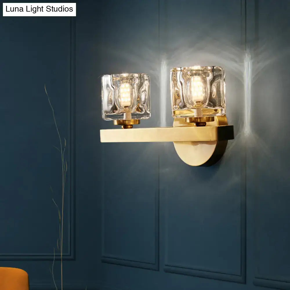 Brass crystal block cylindrical light wall sconce by Decorbites, dual cubes on brass mount on Tampa Home & Garden Store