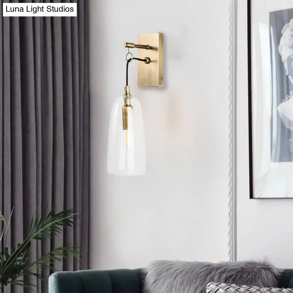 Brass glass sconce lamp with clear shade and brass backplate by Decorbites on Tampa Home & Garden Store