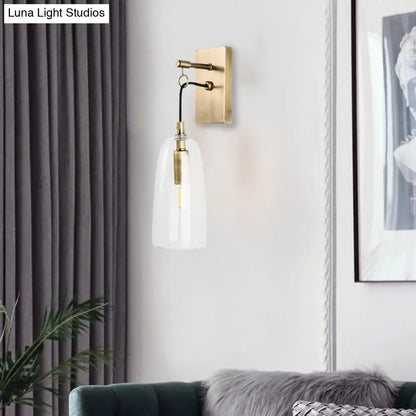 Brass glass sconce lamp with clear shade and brass backplate by Decorbites on Tampa Home & Garden Store