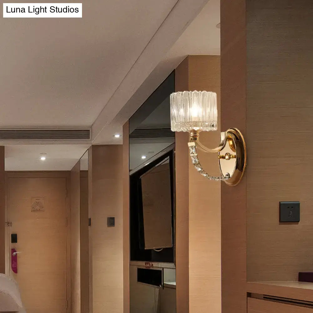 Decorbites brass faceted glass sconce wall-mounted with ribbed shade and curved crystal arm on Tampa Home & Garden Store
